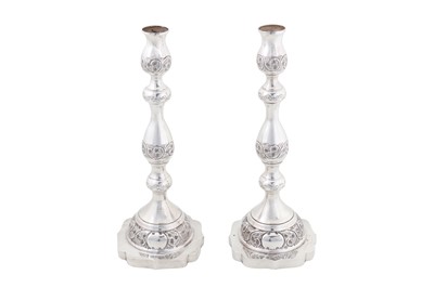 Lot 195 - JUDAICA - A PAIR OF GEORGE VI STERLING SILVER SABBATH CANDLESTICKS, LONDON 1942 BY R.S