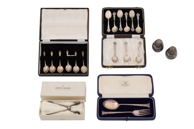 Lot 147 - A pair of Danish sterling silver sugar tongs, Copenhagen by Georg Jensen, Import marks for London 1931 by George Stockwell