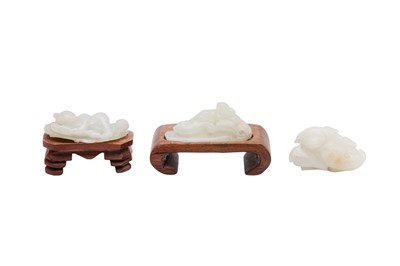 Lot 55 - THREE CHINESE CELADON JADE CARVINGS