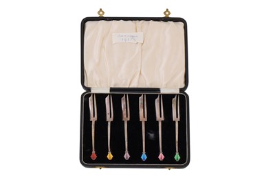 Lot 115 - A cased set of George V Art Deco sterling silver and guilloche enamel cake forks, Birmingham 1935 by William Hair Haseler