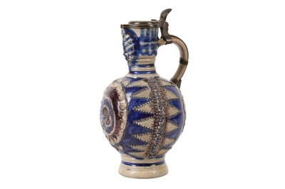 Lot 203 - A GERMAN WESTERWALD ENGHALSKANNE PEWTER LIDDED JUG