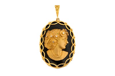 Lot 31 - AN ONYX PORTRAIT PENDANT, CIRCA 1976