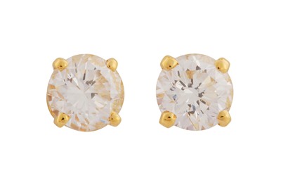 Lot 218 - CARTIER Ι A PAIR OF DIAMOND STUD EARRINGS, CIRCA 1995
