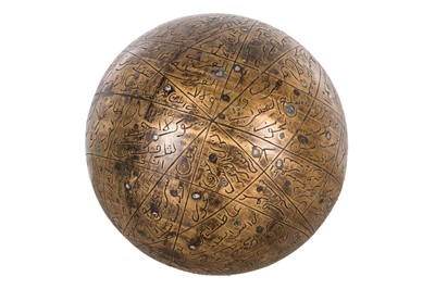 Lot 27 - AN ENGRAVED BRASS CELESTIAL GLOBE