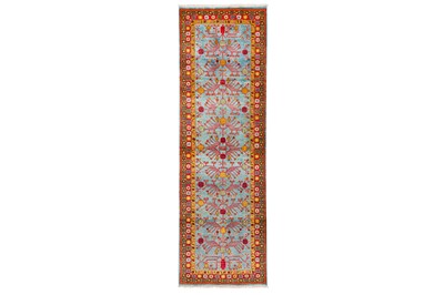 Lot 65 - A FINE KHOTAN DESIGN RUNNER