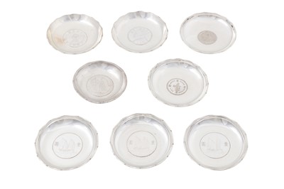 Lot 253 - Eight mid-20th century Chinese export silver coin set dishes, one marked for Wai Kee of Hong Kong