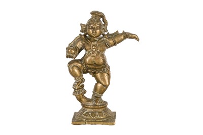 Lot 14 - A SMALL BRONZE DANCING KRISHNA