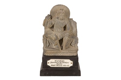 Lot 2 - A GHANDHARAN STONE SCULPTURE OF KUVERA