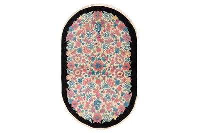 Lot 13 - A FINE CHINESE OVAL RUG