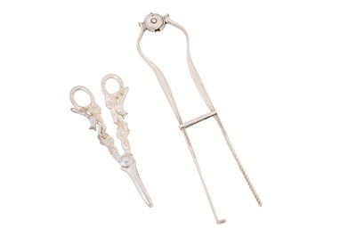 Lot 145 - A pair of George III sterling silver asparagus tongs, London 1791 by silver asparagus tongs, London 1791 by William Burch