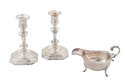 Lot 197 - A pair of Victorian sterling silver candlesticks, London 1897 by Thomas Bradbury