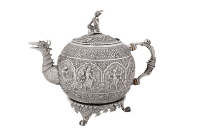 Lot 233 - A late 19th / early 20th century Burmese unmarked silver teapot, Rangoon circa 1900