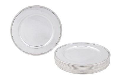 Lot 391 - A matched set of twelve late 20th century Danish 830 standard silver dinner or under plates, eight Arhus circa 1970 by Niels Ingvardt Johansen (active 1965-74)