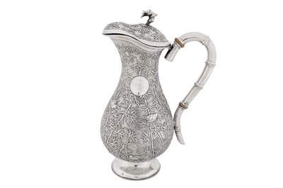 Lot 21 - A mid-20th century Chinese export silver claret jug or ewer, Shangahi circa 1940, marked Shao Ying Tang, retailed by Jade Store of Hong Kong
