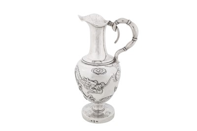 Lot 12 - An early 20th century Chinese export silver small ewer, Shanghai or Canton circa 1920, marked Hou Thai, retailed by Wang Hing
