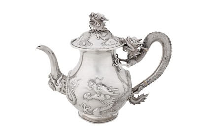 Lot 4 - An early 20th century Chinese export silver coffee pot, Canton or Hong Kong circa 1920, marked Wen Wei Ji, retailed by Chong Woo of Hong Kong