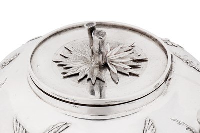 Lot 123 - A late 19th / early 20th century Chinese export silver three-piece tea service, Canton circa 1900, marked Ye Bo, retailed by Wang Hing