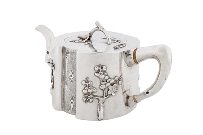 Lot 102 - A late 19th / early 20th century Chinese export silver three-piece tea service, Canton or Shanghai circa 1900, marked Qi Xiang, retailed by Pao Kuang of Hong Kong