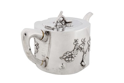 Lot 102 - A late 19th / early 20th century Chinese export silver three-piece tea service, Canton or Shanghai circa 1900, marked Qi Xiang, retailed by Pao Kuang of Hong Kong