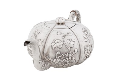 Lot 20 - An early 20th century Chinese export silver three-piece tea service, Shanghai circa 1930, marked Shao Ying Tang, retailed by China Jewellery Company