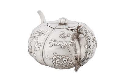 Lot 20 - An early 20th century Chinese export silver three-piece tea service, Shanghai circa 1930, marked Shao Ying Tang, retailed by China Jewellery Company