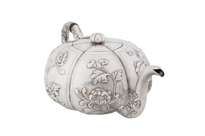 Lot 20 - An early 20th century Chinese export silver three-piece tea service, Shanghai circa 1930, marked Shao Ying Tang, retailed by China Jewellery Company