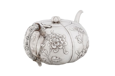 Lot 20 - An early 20th century Chinese export silver three-piece tea service, Shanghai circa 1930, marked Shao Ying Tang, retailed by China Jewellery Company