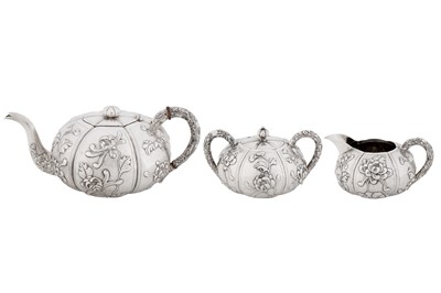 Lot 20 - An early 20th century Chinese export silver three-piece tea service, Shanghai circa 1930, marked Shao Ying Tang, retailed by China Jewellery Company