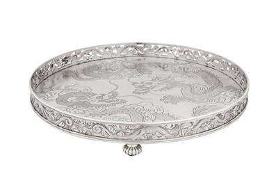 Lot 122 - A late 19th century Chinese export silver tray, Canton circa 1890, marked Qiu Ji, retailed by Wang Hing