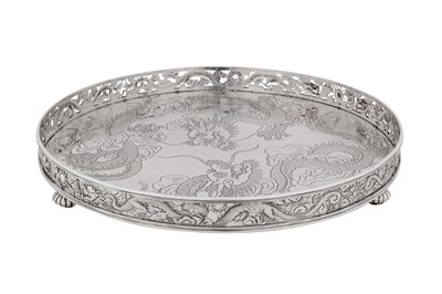 Lot 122 - A late 19th century Chinese export silver tray, Canton circa 1890, marked Qiu Ji, retailed by Wang Hing