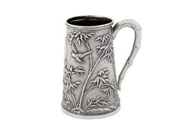 Lot 56 - An early 20th century Chinese export silver christening mug, Shanghai circa 1920, marked Ren An, retailed by Cum Shing
