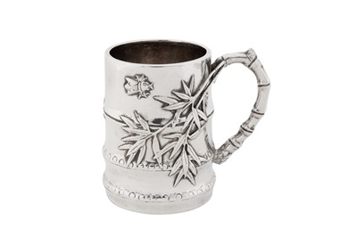 Lot 57 - A late 19th / early 20th century Chinese export silver christening mug, Canton circa 1910, marked Rong Fa, retailed by Kwan Wo of Canton and Hong Kong