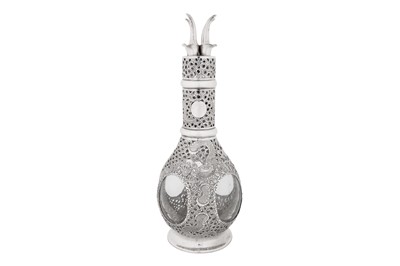 Lot 30 - An early 20th century Chinese export silver mounted four bottle bitters decanter, Hong Kong circa 1930, retailed by Tack Hing