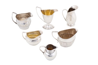 Lot 208 - A mixed group of sterling silver cream and milk jugs