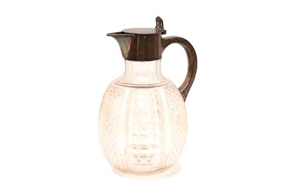Lot 210 - A Victorian sterling silver mounted claret jug, London 1890 by Edward Hutton