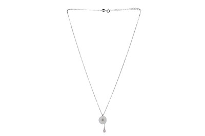 Lot 445 - A NEPHRITE AND DIAMOND PENDANT
