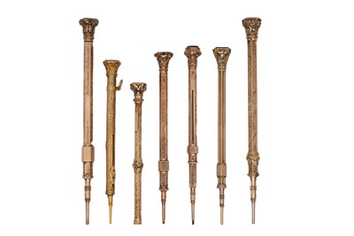 Lot 94 - A GROUP OF SEVEN VICTORIAN GILT METAL HARDSTONE SET PROPELLING PENCILS