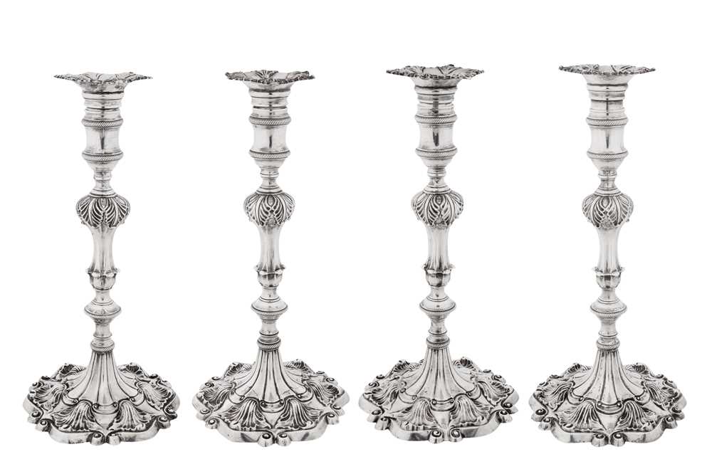 570 - A set of four George III sterling silver candlesticks, London 1765 by Ebenezer Coker