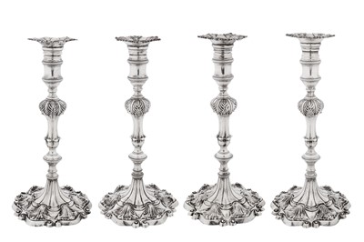 Lot 570 - A set of four George III sterling silver candlesticks, London 1765 by Ebenezer Coker