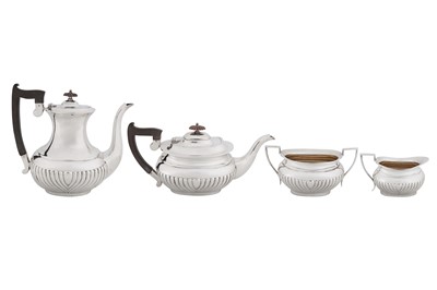 Lot 474 - A George V sterling silver four-piece tea and coffee service, Sheffield 1918 by Emile Viner