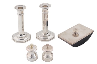 Lot 196 - A pair of George V sterling silver candlesticks, Birmingham 1921, maker’s mark obscured
