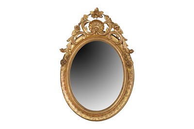 Lot 329 - AN OVAL CARVED GILTWOOD MIRROR, LATE 19TH CENTURY