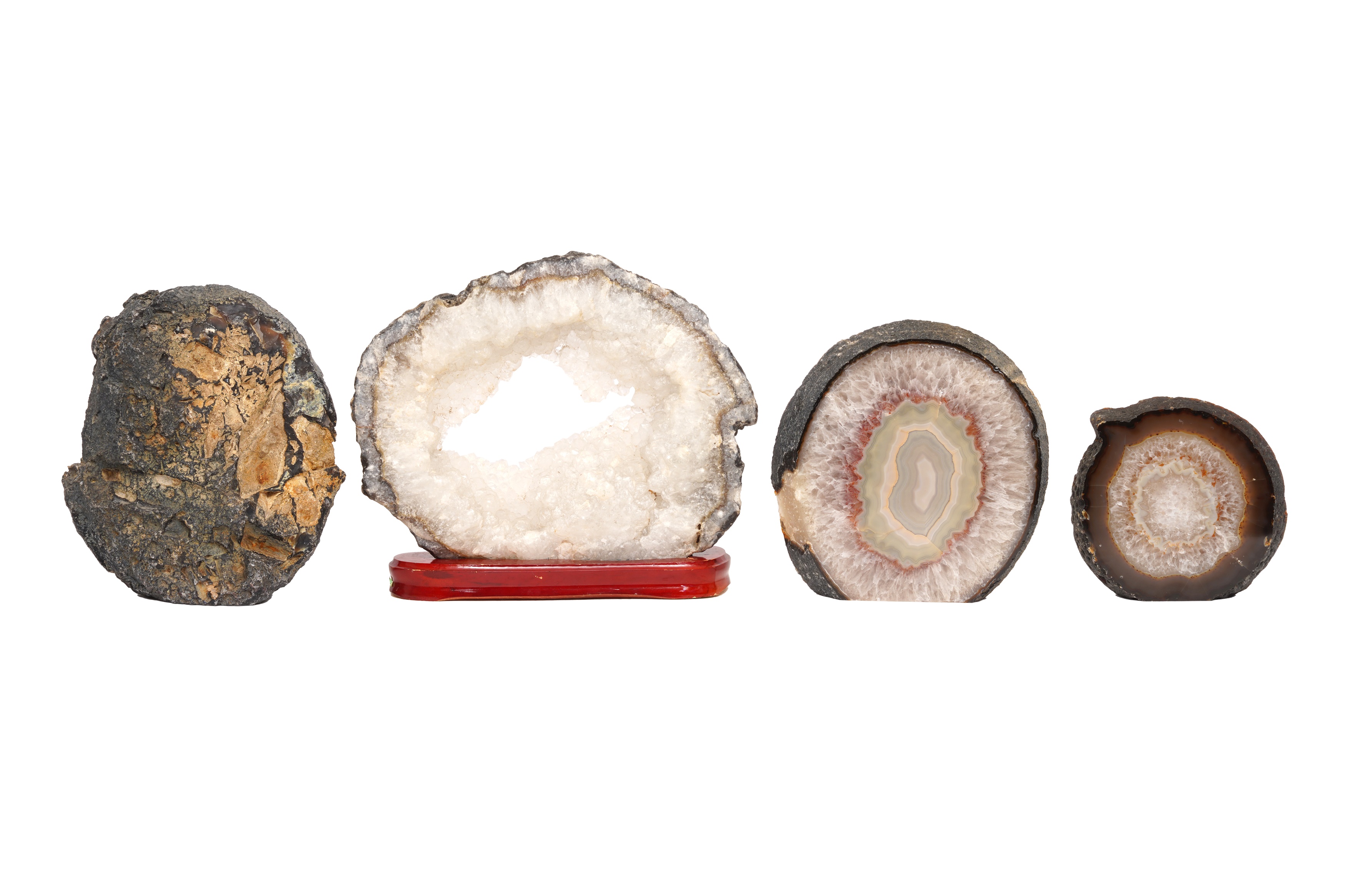 Lot 57 - THREE POLISHED AGATE GEODES AND A QUARTZ