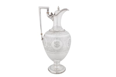 Lot 502 - A Victorian sterling silver wine ewer, London 1874 by Martin, Hall and Co