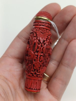 Lot 77 - A CHINESE CINNABAR LACQUER 'HORSES' SNUFF BOTTLE