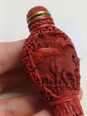 Lot 77 - A CHINESE CINNABAR LACQUER 'HORSES' SNUFF BOTTLE