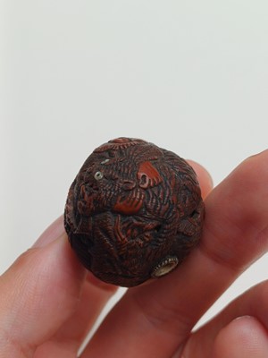 Lot 850 - A JAPANESE CARVED WALNUT NETSUKE (KURUMI), SIGNED SEIMIN