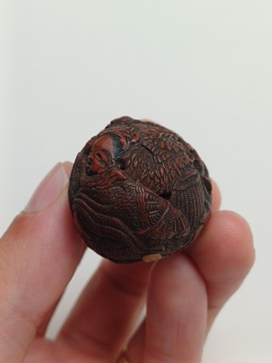 Lot 850 - A JAPANESE CARVED WALNUT NETSUKE (KURUMI), SIGNED SEIMIN