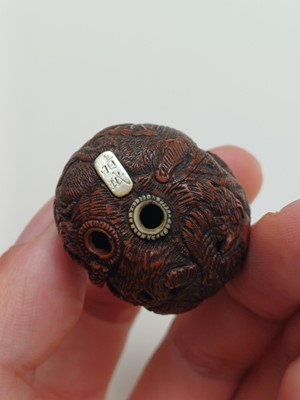 Lot 850 - A JAPANESE CARVED WALNUT NETSUKE (KURUMI), SIGNED SEIMIN
