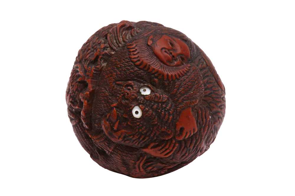 850 - A JAPANESE CARVED WALNUT NETSUKE (KURUMI), SIGNED SEIMIN